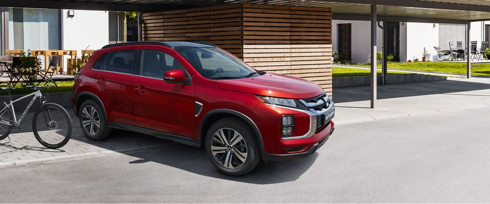 Vehicles RVR 2024 Gallery red parked