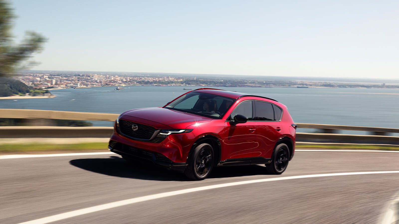 2026 Mazda CX-5 driving on coastal road