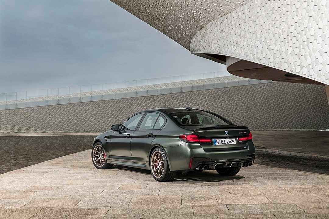 Three quarter rear view of a parked 2022 BMW M5 CS