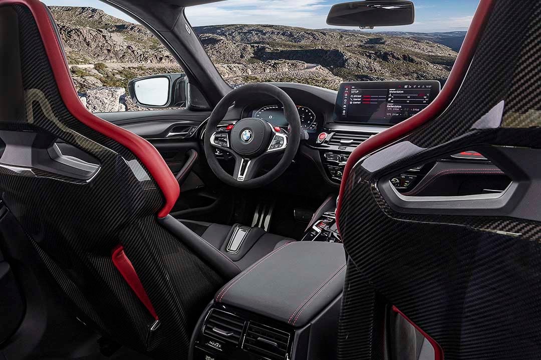 View of the very sporty cockpit of the 2022 BMW M5 CS