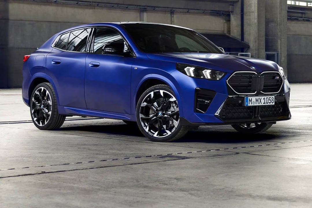 3/4 front and side view of the BMW X2 2025 emerging from an underground car park