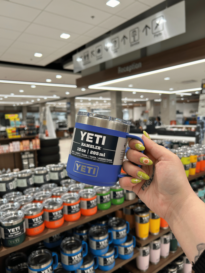 Close-up of a hand holding a YETI 10oz Stackable mug from West Edmonton Mall Toyota