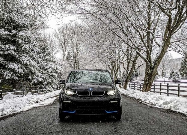 A Bmw with winter tires and snowy roads